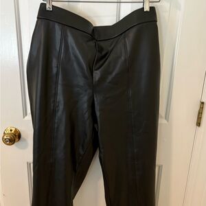 Black faux leather pants.